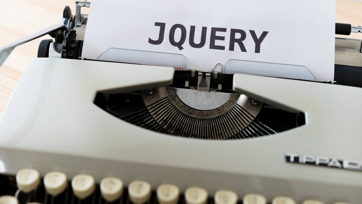 Decorative image of a typewriter with the word "jQuery" typed on a sheet of paper.